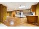 Basement includes a partial kitchen with bar seating and adjacent living space at 1207 Chadbourne Ave, Concord, NC 28027