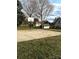 Outdoor basketball court in the backyard provides recreation and entertainment at 1207 Chadbourne Ave, Concord, NC 28027