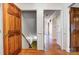 Hallway features hardwood flooring and wooden doors at 1207 Chadbourne Ave, Concord, NC 28027