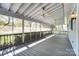 Bright and airy screened porch with views of the surrounding greenery at 1207 Chadbourne Ave, Concord, NC 28027