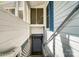 Exterior staircase leading down to a walkout basement at 1207 Chadbourne Ave, Concord, NC 28027