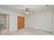 Bedroom with large closet, neutral walls, carpet and ceiling fan at 125 Cherokee Dr, Mooresville, NC 28117