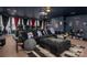 Finished basement home theater with reclining chairs, a projector, and Star Wars themed decor for ultimate entertainment at 15309 Guthrie Dr, Huntersville, NC 28078