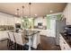 Spacious kitchen featuring an island with seating, stainless steel appliances, and a pantry at 15309 Guthrie Dr, Huntersville, NC 28078