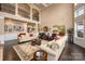 Expansive living room with soaring ceilings, hardwood floors, and an open layout at 15309 Guthrie Dr, Huntersville, NC 28078