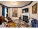Comfortable living room with fireplace, and warm decor at 15309 Guthrie Dr, Huntersville, NC 28078