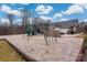 Community playground with various play structures and equipment for children to enjoy at 15309 Guthrie Dr, Huntersville, NC 28078