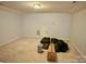 Large basement with carpet and a small storage area at 1726 Still River Way, Fort Mill, SC 29708