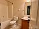 Cozy bathroom featuring a shower-tub combo, toilet, vanity, and neutral-toned walls at 1726 Still River Way, Fort Mill, SC 29708