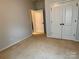 Bedroom featuring carpet floors and a closet at 1726 Still River Way, Fort Mill, SC 29708