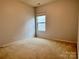 Clean bedroom with carpet floors and a window at 1726 Still River Way, Fort Mill, SC 29708