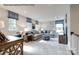 Spacious living room with neutral colors, plush carpeting, stylish furniture, and lots of natural light at 1813 Ab Moore Jr Dr # 3239, Indian Trail, NC 28079
