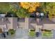A bird's eye view of the home and surrounding area showcasing manicured lawns and mature trees at 200 W 18Th St, Newton, NC 28658