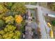 An aerial view of the homes showing mature landscaping in autumn and ample parking at 200 W 18Th St, Newton, NC 28658