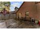 This backyard patio is fenced in and features a table and chairs for outdoor seating at 200 W 18Th St, Newton, NC 28658