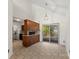 Dining area featuring tile flooring, access to a patio via glass sliding door, and a breakfast bar to the kitchen at 200 W 18Th St, Newton, NC 28658