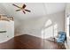 Bright living room with hardwood floors, vaulted ceiling, and natural light from a large window at 200 W 18Th St, Newton, NC 28658