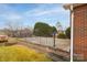 Back patio with iron guard rail and a view of the back yard at 2625 20Th Ne St, Hickory, NC 28601