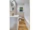 This bathroom features a bright vanity, wood-look floors, and a shower and tub combination at 2625 20Th Ne St, Hickory, NC 28601