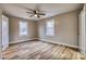 Bedroom with neutral colored walls, two windows to provide natural light and wood-look flooring at 2625 20Th Ne St, Hickory, NC 28601