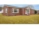 Charming brick home featuring a well-maintained lawn and inviting front entrance at 2625 20Th Ne St, Hickory, NC 28601