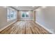 Bright living room with laminate floors, neutral paint and large windows at 2625 20Th Ne St, Hickory, NC 28601