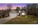 Charming single-Gathering home featuring a two-car garage, well-kept lawn, and inviting entrance at 2801 Parkwest Dr, Albemarle, NC 28001