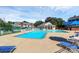 A community pool area with a gazebo and lounge chairs for residents to enjoy at 2900 Heathstead Pl # H, Charlotte, NC 28210