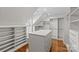 A spacious walk-in closet with built-in shelving, drawers, and hardwood floors at 332 Hempstead Pl, Charlotte, NC 28207