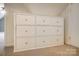 Close-up of built-in storage in the carpeted attic space for organization and convenience at 340 Tradewinds Ln, York, SC 29745