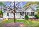 Exterior of home with sunroom, siding, and mature trees at 340 Tradewinds Ln, York, SC 29745