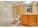 Full bathroom with tub and shower combo, vanity and toilet, plus decorative wallpaper border at 340 Tradewinds Ln, York, SC 29745