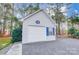Detached garage with siding, and a blue shutter at 340 Tradewinds Ln, York, SC 29745