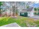 A detached garage with painted siding, and a manicured lawn at 340 Tradewinds Ln, York, SC 29745