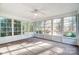 Bright sunroom surrounded by many windows to let in natural light and sunshine at 340 Tradewinds Ln, York, SC 29745
