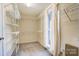 Well-lit walk-in closet with wire shelving, providing ample storage space and organization options at 340 Tradewinds Ln, York, SC 29745