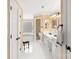 Bright bathroom with dual sinks, and separate tub and toilet areas at 3419 Wylie Meadow Ln, Charlotte, NC 28269