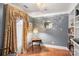 Stylish bedroom with hardwood floors, a decorative mirror and lots of natural light at 3419 Wylie Meadow Ln, Charlotte, NC 28269