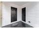 A covered entryway features two black doors, providing private access points at 426 Holland Memorial Church Rd, Bessemer City, NC 28016