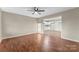 Spacious living room with beautiful hardwood floors and an open layout to the next room at 426 Holland Memorial Church Rd, Bessemer City, NC 28016