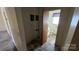 Large utility room with washer/dryer hook-ups, and access to a full bathroom at 509 California Cir, York, SC 29745