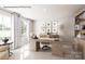 Home office with large windows, neutral carpet, a built-in bookcase, and a light-colored, modern desk at 554 Nesbe St # 2294, Lancaster, SC 29720