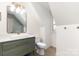 Well-lit bathroom featuring a modern vanity, contemporary mirror, and a sleek design at 6525 Castlegate Dr, Charlotte, NC 28226