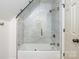 Bathroom with a glass shower enclosure and sleek fixtures, offering a spa-like experience at 6525 Castlegate Dr, Charlotte, NC 28226