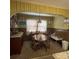 Cozy dining room with a wooden table and chairs under an arched doorway at 708 Mount Olive Church Rd, Newton, NC 28658