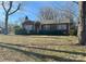 Charming brick home with a well-maintained front yard and mature trees at 708 Mount Olive Church Rd, Newton, NC 28658