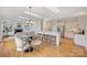 Open-concept kitchen connected to the living area with a breakfast bar and stainless appliances at 8000 Greencastle Dr, Charlotte, NC 28210