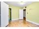 Bedroom showcasing hardwood floors with doors to the bathroom and closet at 801 E Liberty St, Salisbury, NC 28144