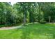 Serene backyard featuring lush greenery and a picturesque landscape at 8143 Summit Ridge Dr # 41, Catawba, NC 28609