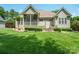 Relaxing screened porch and lush green lawn enhance this home's outdoor appeal at 8143 Summit Ridge Dr # 41, Catawba, NC 28609